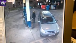 frau versucht zu tanken an der t