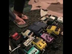 Guy Makes a Balloon and Rubber Band Sound Like an Electric Guitar guy makes a balloon and rubber b