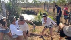 Posing Tourists Given Fright in Crocodile Prank posing tourists given fright in