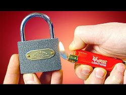 Wir öffnen ein Vorhängeschloss mit einer Flamme wir oeffnen ein vorhaengeschloss